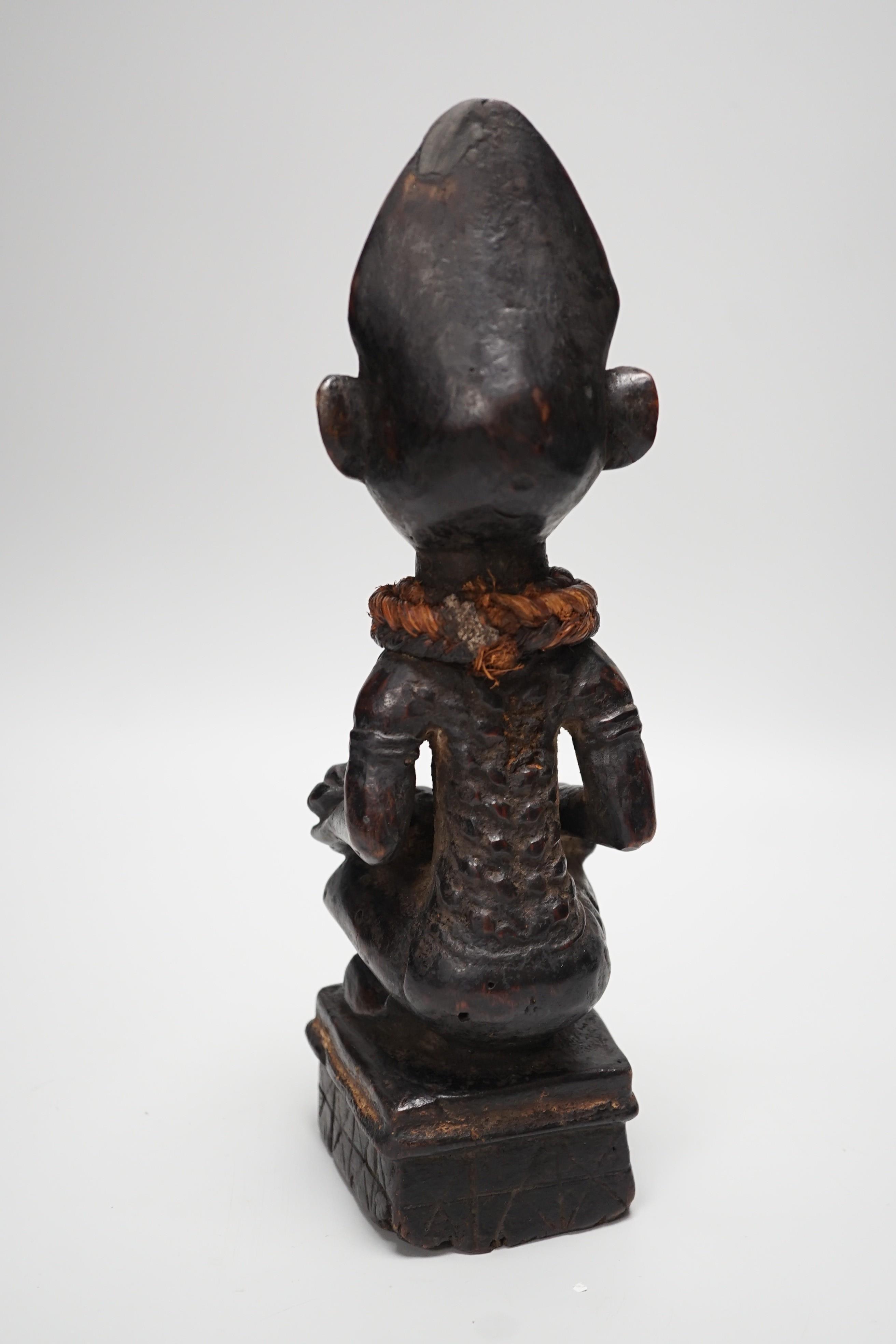 An African tribal wooden maternity figure, Yombe tribe Congo 30cm